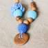 Collier d'allaitement / portage KangarooCare Flower turquoise/bleu